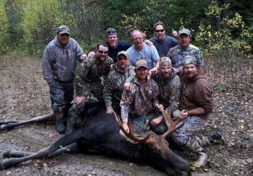 Group Of Moose Hunter With Moose
