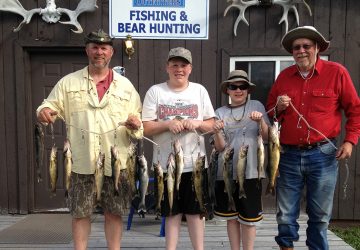 Group With Stringer Of Walleye