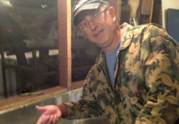 Man Pointing At Walleye