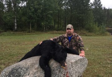 Man With Hunted Bear